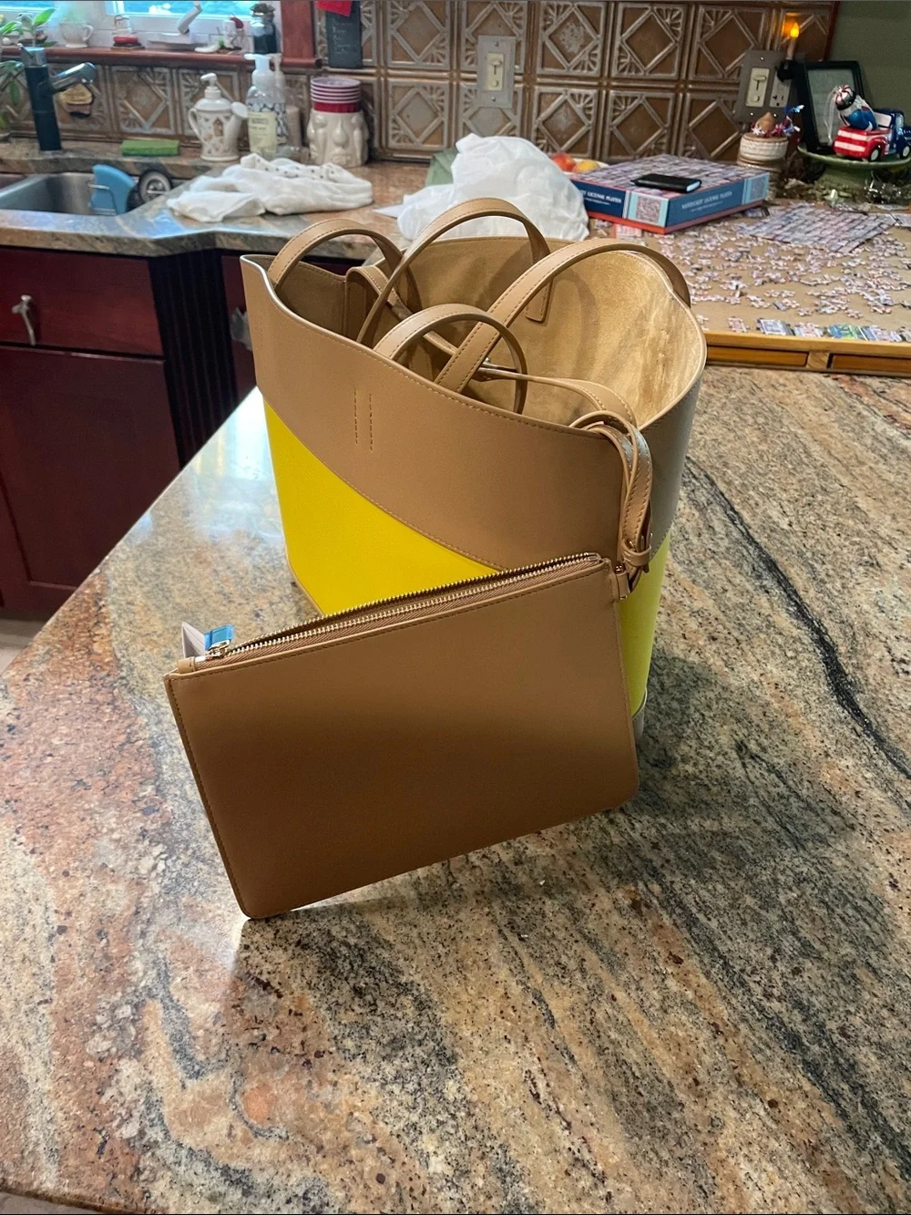 Brand new. Salvatore Ferragamo Yellow and Tan Colorblock Leather Tote with Pouch